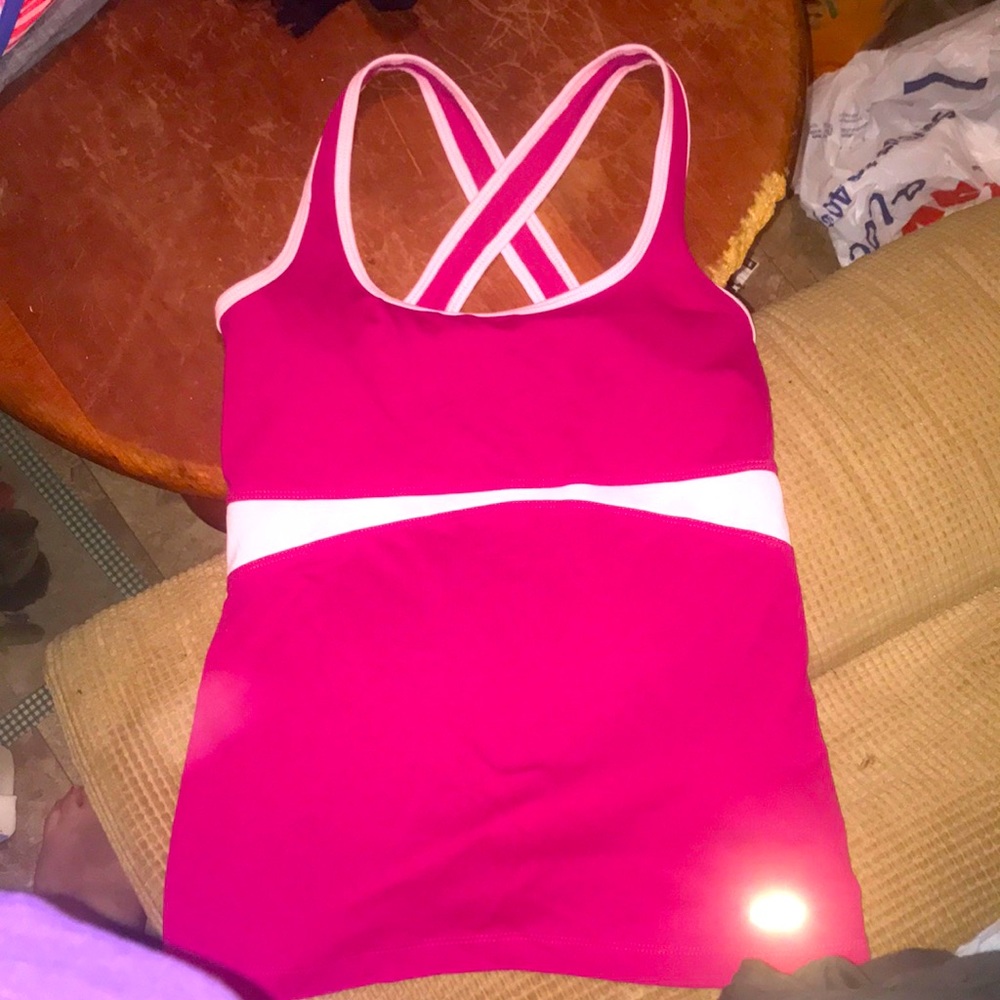 Champion pink cross strapped tank top.